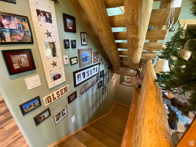stairs with wood finished floors