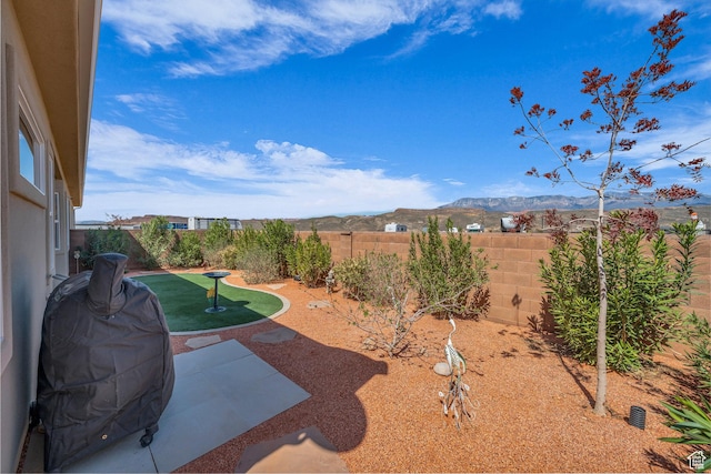 3086 W 570 N, Hurricane, UT 84737 - view of yard with a patio area, a fenced backyard, and a mountain view