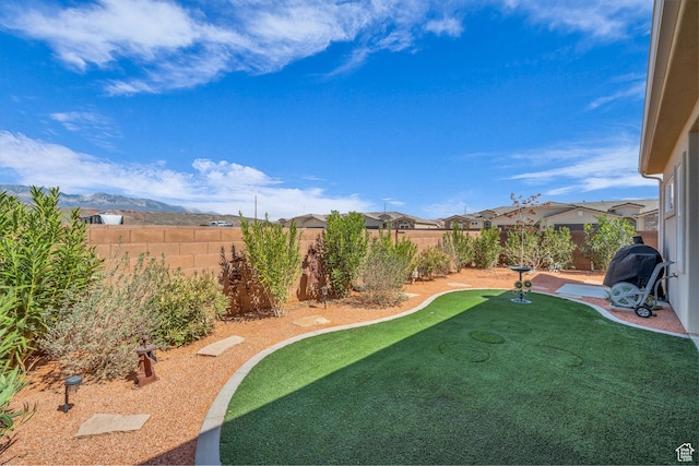 3086 W 570 N, Hurricane, UT 84737 - view of yard with a mountain view and a fenced backyard