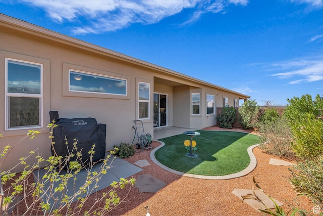 3086 W 570 N, Hurricane, UT 84737 - back of property with a patio area, stucco siding, and fence