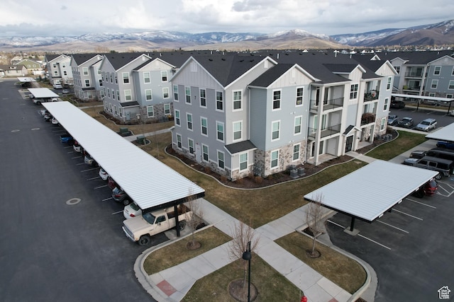 bird's eye view featuring a mountain view and a residential view