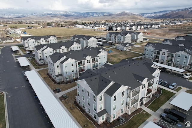 bird's eye view featuring a mountain view and a residential view