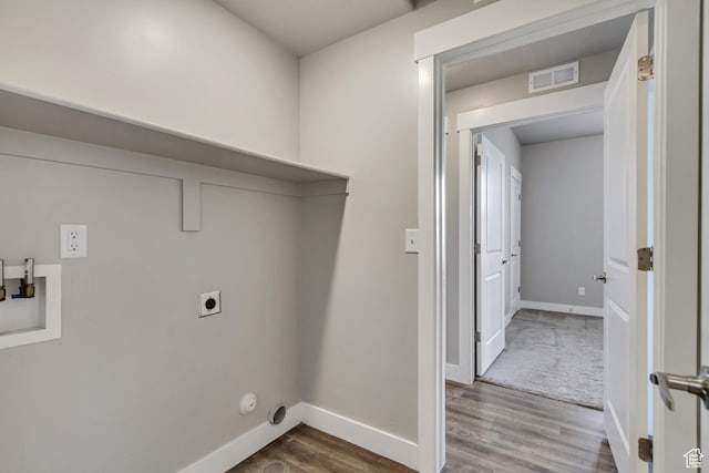 laundry room featuring visible vents, washer hookup, dark wood-style flooring, laundry area, and electric dryer hookup
