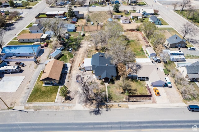 birds eye view of property with a residential view