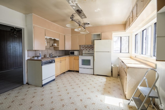kitchen with white appliances, backsplash, open shelves, light floors, and light brown cabinetry