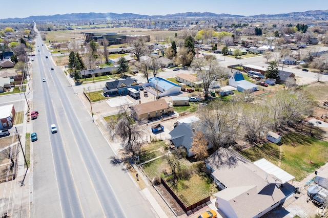 aerial view featuring a mountain view and a residential view