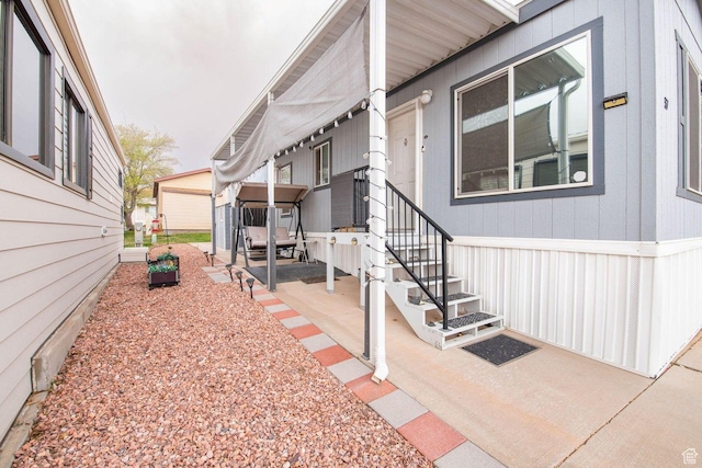 1150 W Red Hills Pkwy Unit 57, Washington, UT 84780 - view of home's exterior featuring a patio