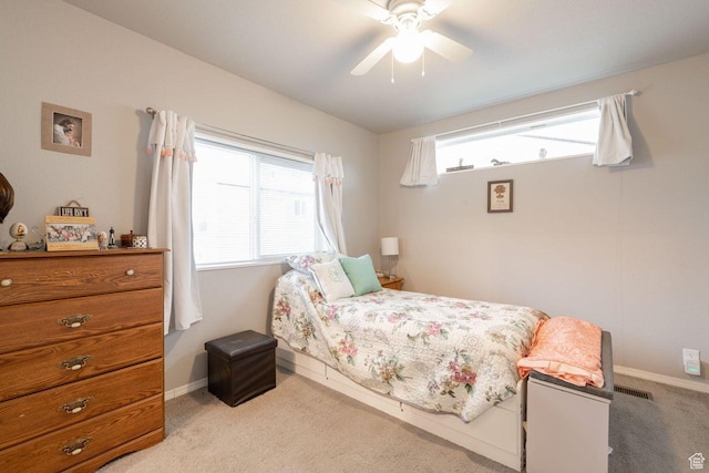 1150 W Red Hills Pkwy Unit 57, Washington, UT 84780 - carpeted bedroom featuring baseboards and ceiling fan