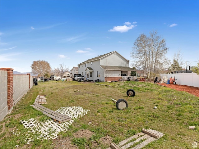 4572 W Bingham Park Dr S, West Jordan, UT 84088 - view of yard with a fenced backyard