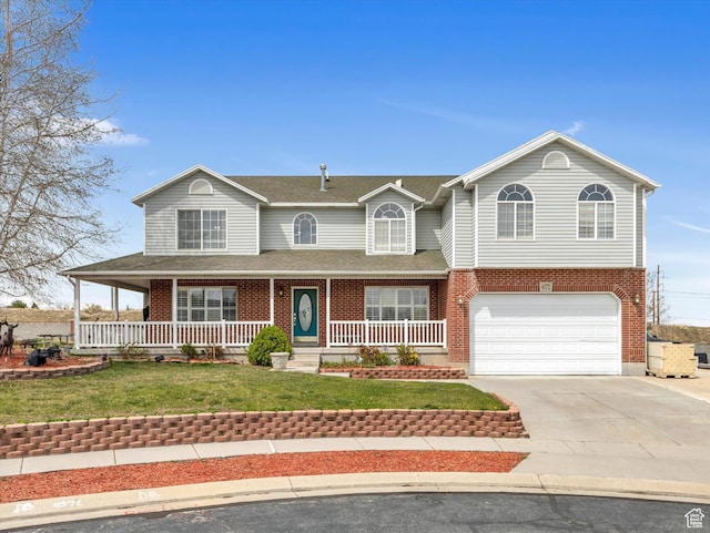 view of front facade with covered porch, a garage, driveway, and brick siding