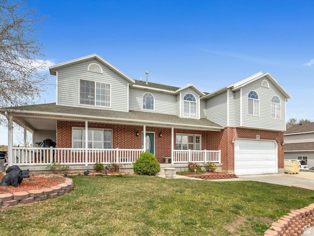 4572 W Bingham Park Dr S, West Jordan, UT 84088 - view of front of property with a porch, a front lawn, brick siding, a garage, and driveway