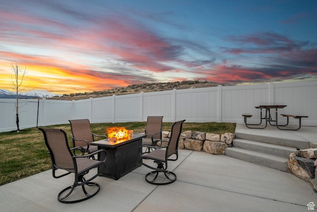7091 N Oquirrh Ranch Pkwy, Eagle Mountain, UT 84005 - view of patio / terrace featuring a fire pit and a fenced backyard