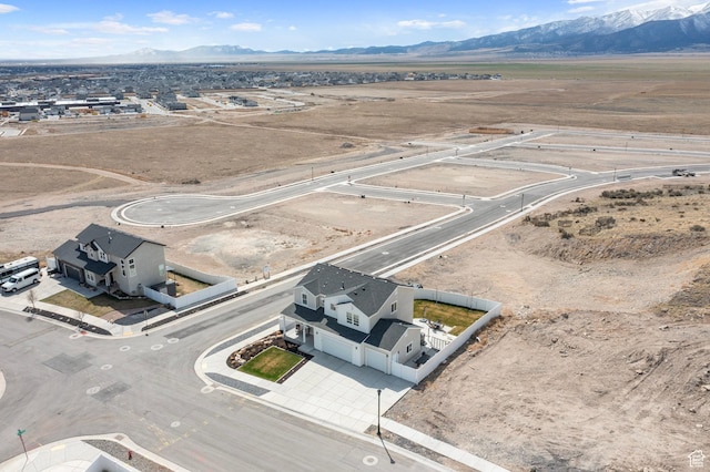 7091 N Oquirrh Ranch Pkwy, Eagle Mountain, UT 84005 - drone / aerial view featuring a mountain view