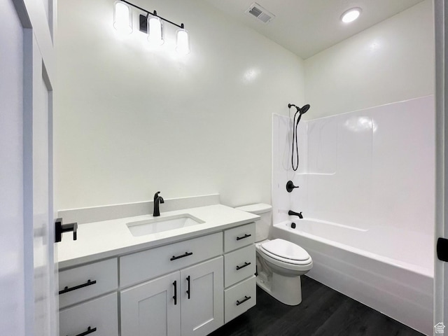 631 N 4250 W, Vernal, UT 84078 - full bathroom with vanity, visible vents, toilet, wood finished floors, and shower / bathing tub combination