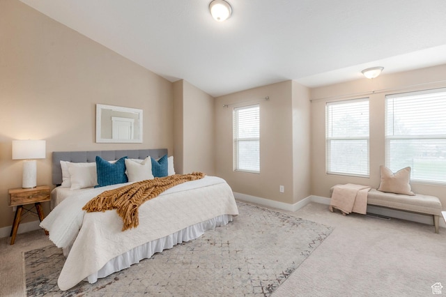 3723 S Gowan Ln W, Salt Lake City, UT 84115 - bedroom with light carpet, baseboards, and vaulted ceiling