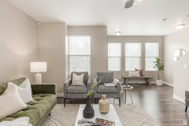 3723 S Gowan Ln W, Salt Lake City, UT 84115 - living room featuring a wealth of natural light, a ceiling fan, wood finished floors, and baseboards