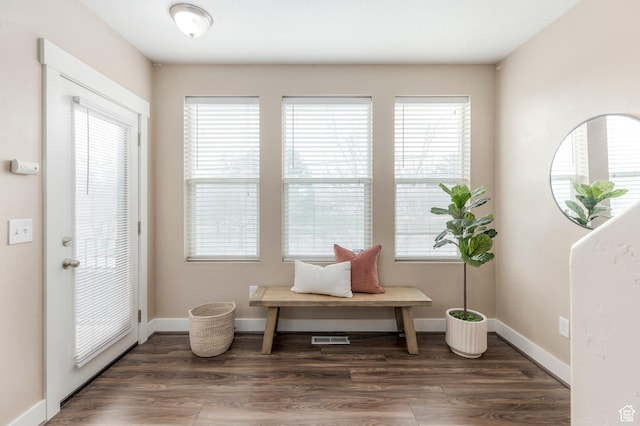 3723 S Gowan Ln W, Salt Lake City, UT 84115 - living area featuring wood finished floors, baseboards, and visible vents