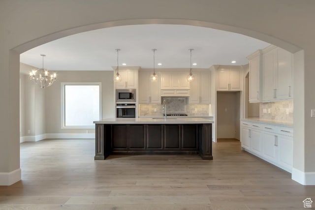 15724 S Rolling Bluff Dr, Draper Ut Cnty, UT 84020 - kitchen with stainless steel appliances, white cabinetry, light countertops, baseboards, and recessed lighting