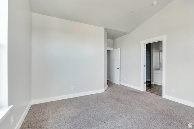 108 W Seasons Dr, Vineyard, UT 84059 - unfurnished bedroom with baseboards, vaulted ceiling, and carpet floors