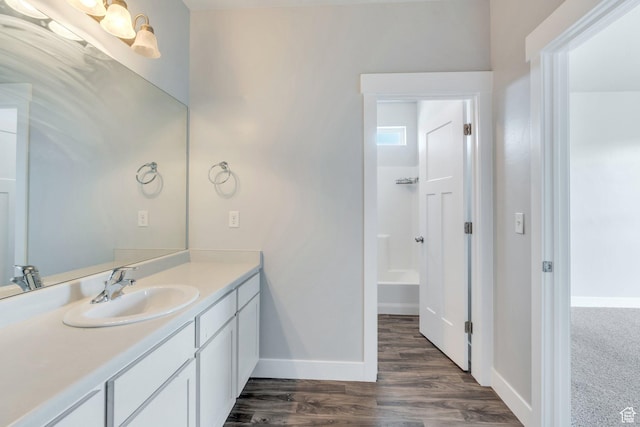 108 W Seasons Dr, Vineyard, UT 84059 - full bath featuring baseboards, vanity, wood finished floors, and tub / shower combination