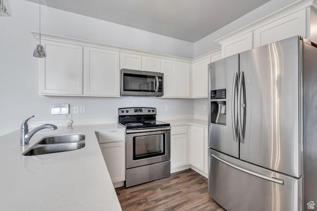 108 W Seasons Dr, Vineyard, UT 84059 - kitchen featuring a sink, white cabinets, dark wood-style floors, and stainless steel appliances