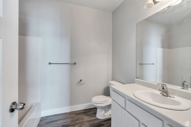 108 W Seasons Dr, Vineyard, UT 84059 - full bathroom featuring vanity, baseboards, toilet, a bath, and wood finished floors