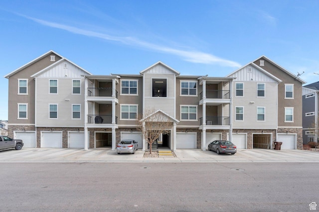 108 W Seasons Dr, Vineyard, UT 84059 - view of building exterior featuring an attached garage