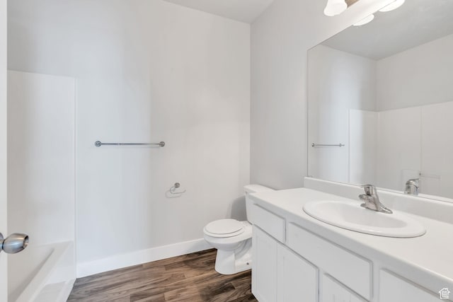 108 W Seasons Dr, Vineyard, UT 84059 - full bathroom featuring toilet, vanity, wood finished floors, and baseboards