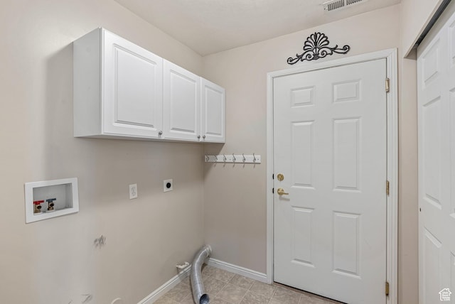 laundry room featuring light tile patterned flooring, hookup for an electric dryer, washer hookup, baseboards, and cabinet space