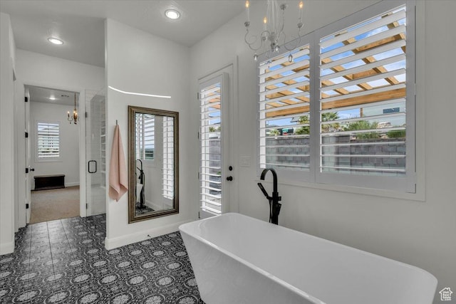 office space featuring an inviting chandelier, baseboards, and recessed lighting
