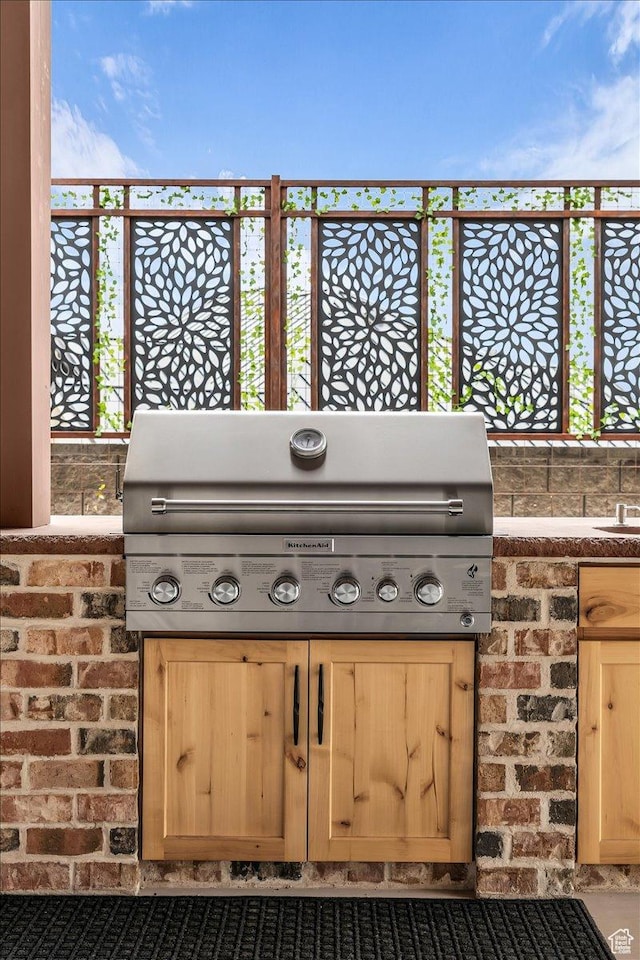exterior space featuring fence and area for grilling