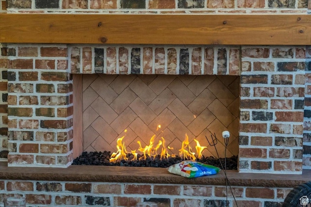 exterior details with a fireplace
