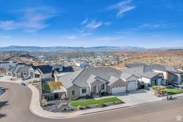 bird's eye view featuring a residential view and a mountain view
