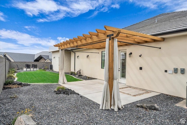 view of patio / terrace with a pergola and a fenced backyard