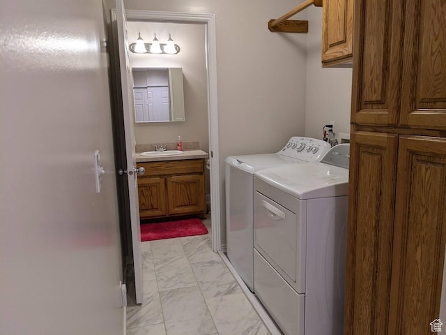 641 W 3550 S, Riverdale, UT 84405 - laundry area with cabinet space, independent washer and dryer, a sink, and marble finish floor