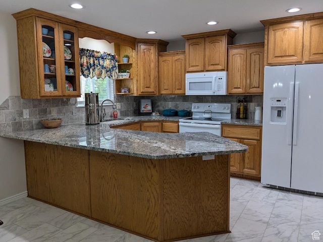 641 W 3550 S, Riverdale, UT 84405 - kitchen featuring a sink, dark stone counters, white appliances, and marble finish floor