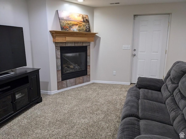 641 W 3550 S, Riverdale, UT 84405 - carpeted living room featuring baseboards, visible vents, and a tiled fireplace