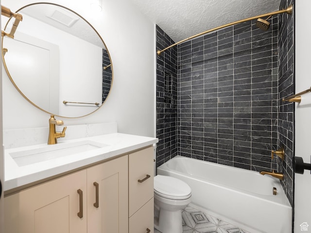 bathroom featuring vanity, shower / tub combination, a textured ceiling, and toilet