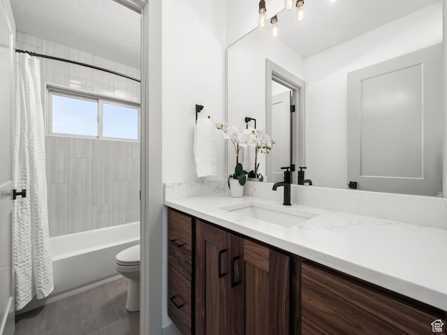 bathroom featuring tile patterned floors, toilet, shower / bathtub combination with curtain, and vanity