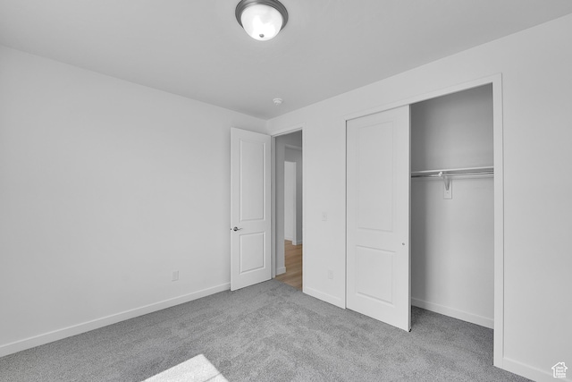 356 W Emma St Unit 625, Grantsville, UT 84029 - unfurnished bedroom with a closet, carpet flooring, and baseboards