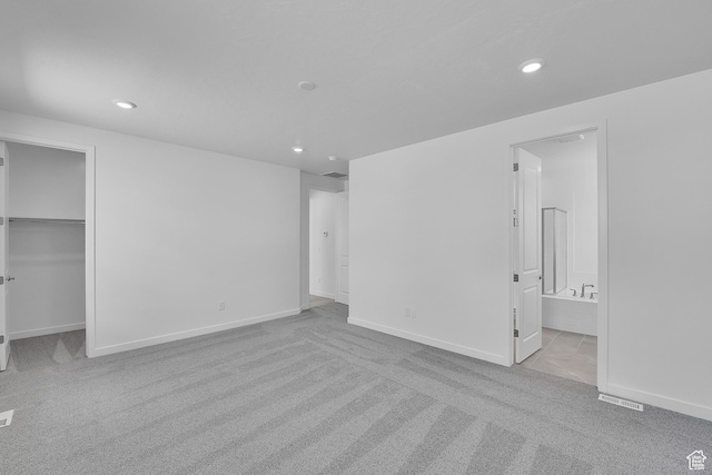 356 W Emma St Unit 625, Grantsville, UT 84029 - unfurnished bedroom featuring carpet flooring, baseboards, a spacious closet, and recessed lighting