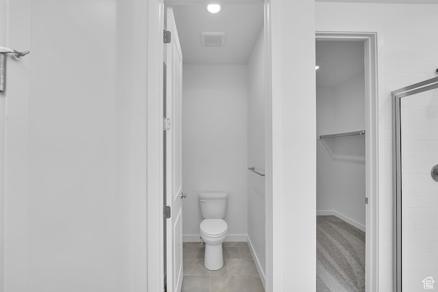 356 W Emma St Unit 625, Grantsville, UT 84029 - full bathroom with baseboards, tile patterned floors, toilet, a shower stall, and visible vents