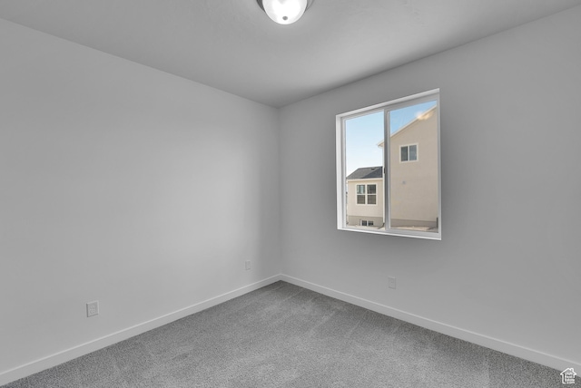 356 W Emma St Unit 625, Grantsville, UT 84029 - empty room with carpet floors and baseboards