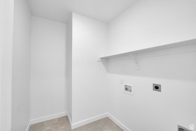 356 W Emma St Unit 625, Grantsville, UT 84029 - laundry room featuring light tile patterned floors, baseboards, laundry area, hookup for an electric dryer, and hookup for a washing machine