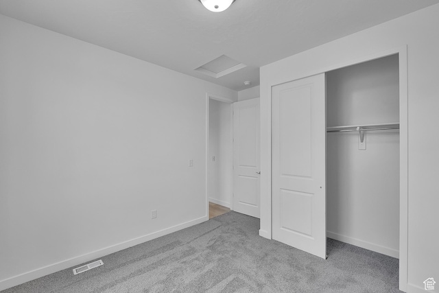 356 W Emma St Unit 625, Grantsville, UT 84029 - unfurnished bedroom with a closet, visible vents, carpet flooring, attic access, and baseboards
