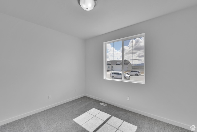356 W Emma St Unit 625, Grantsville, UT 84029 - carpeted spare room with visible vents and baseboards