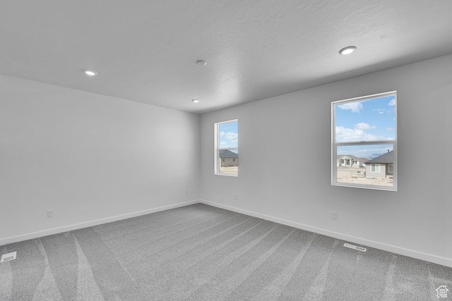 356 W Emma St Unit 625, Grantsville, UT 84029 - unfurnished room featuring carpet floors, baseboards, recessed lighting, and visible vents