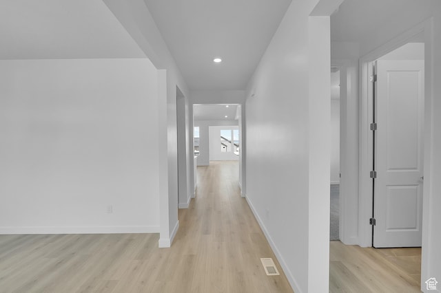 356 W Emma St Unit 625, Grantsville, UT 84029 - hall with light wood-style floors, baseboards, visible vents, and recessed lighting