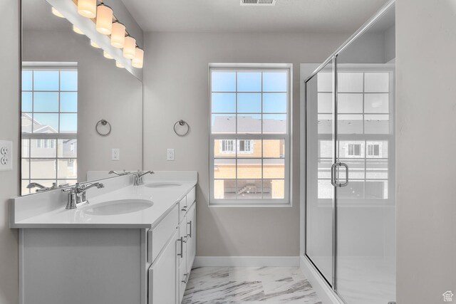 6633 N Price, Eagle Mountain, UT 84005 - bathroom featuring a sink, baseboards, and a shower stall