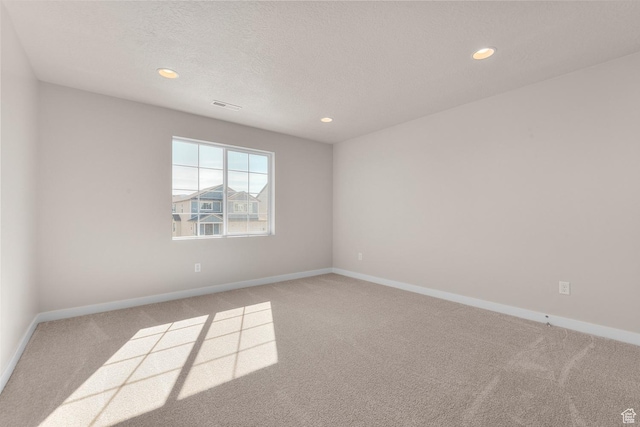 6624 W Prairie Fire Ln, Herriman, UT 84096 - carpeted spare room with visible vents, baseboards, and recessed lighting